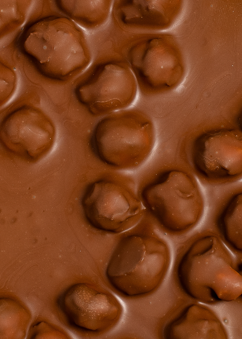 Cœurs Marteau en chocolat au lait Sisao, sertis de noisette
